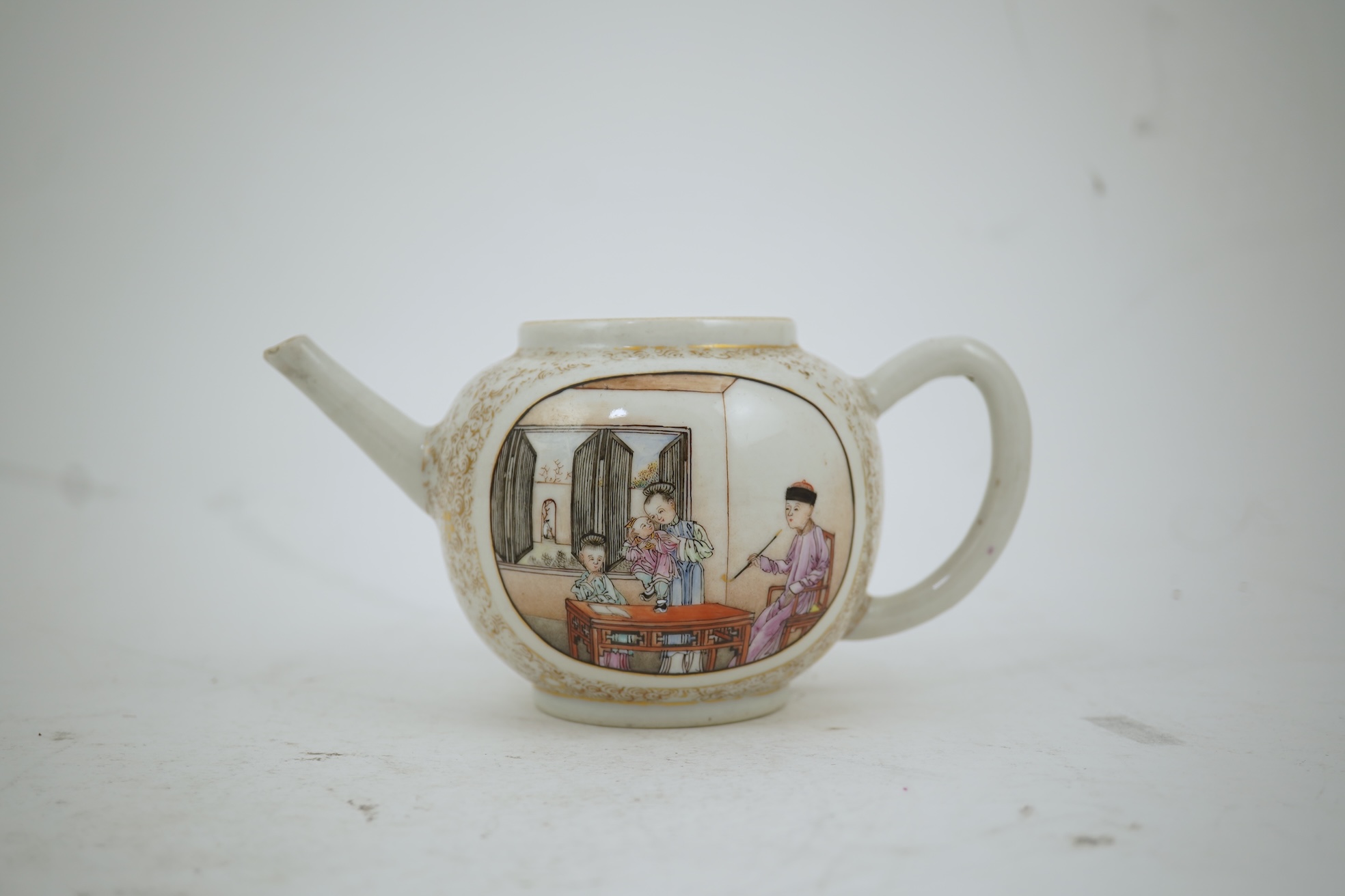 A Chinese export gilt and famille rose teapot, Yongzheng / Qianlong period